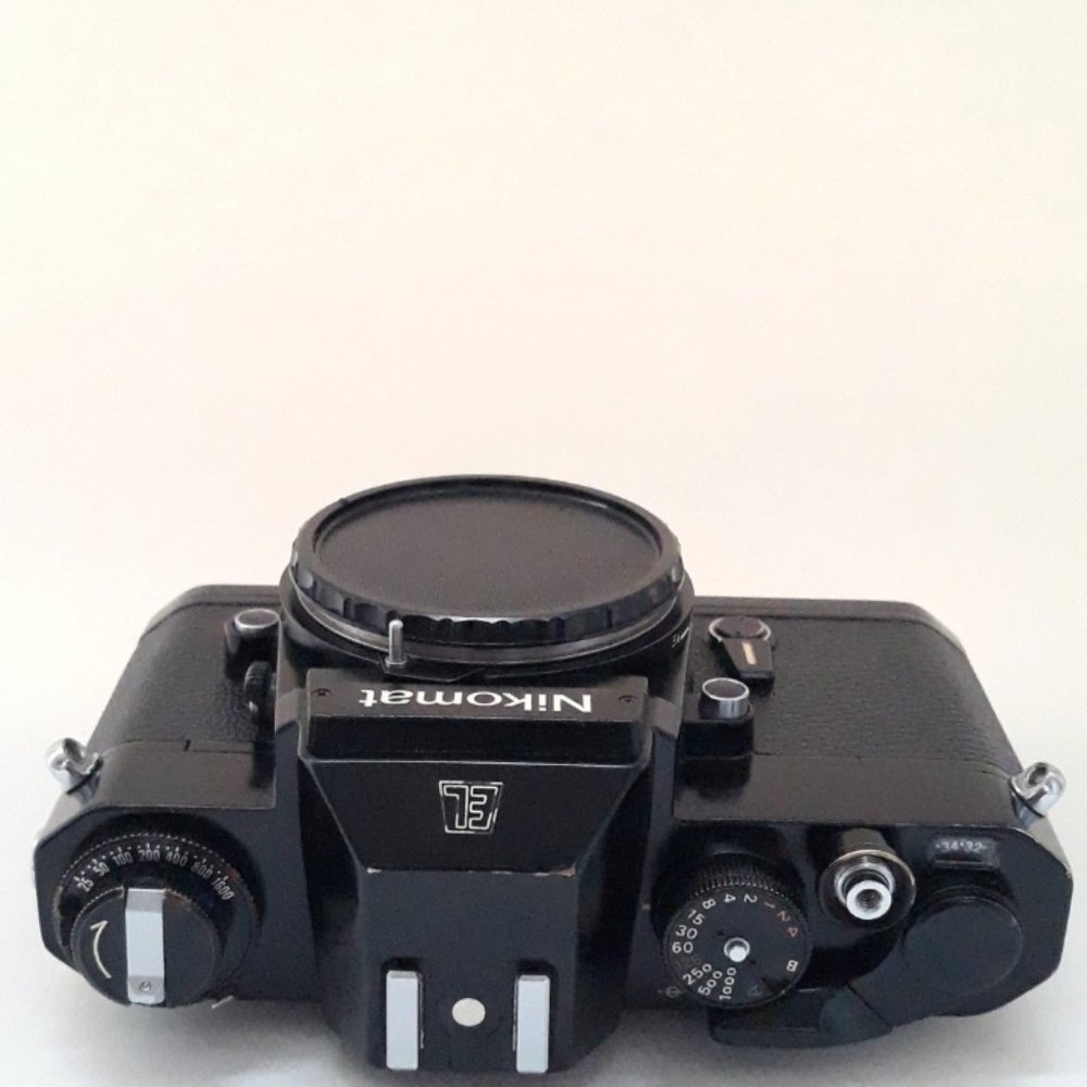 Nikon Nikkomat EL Nikkor 35-80mm 4-5.6D Zoom lens. Leather case